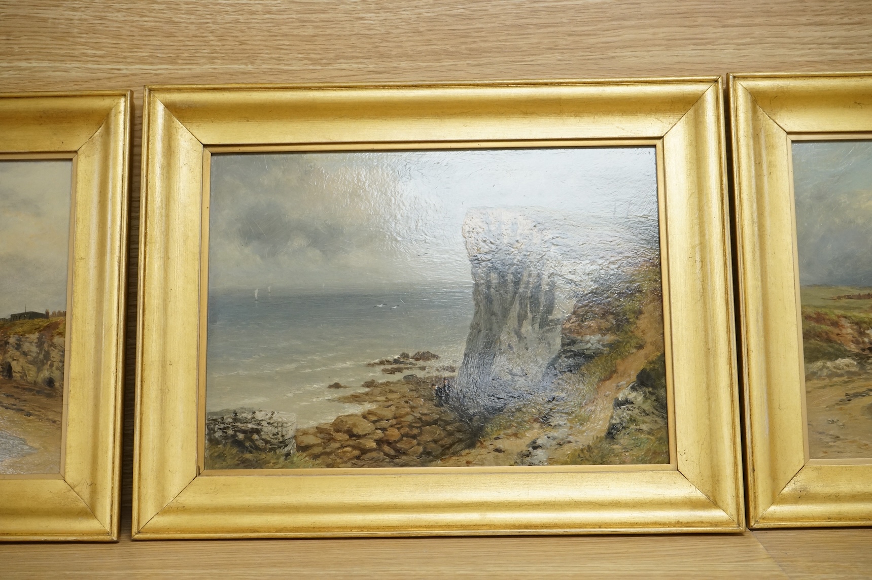 Early 20th century, English school, set of four coastal scenes believed to be Wearside, unsigned, oils on board, 19 x 28cm